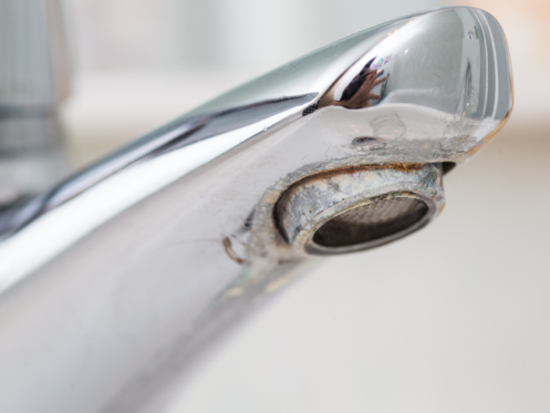 image of hard water faucet