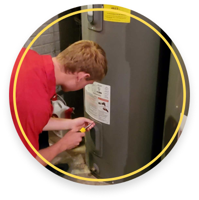 Golden Rule technician repairing a water heater