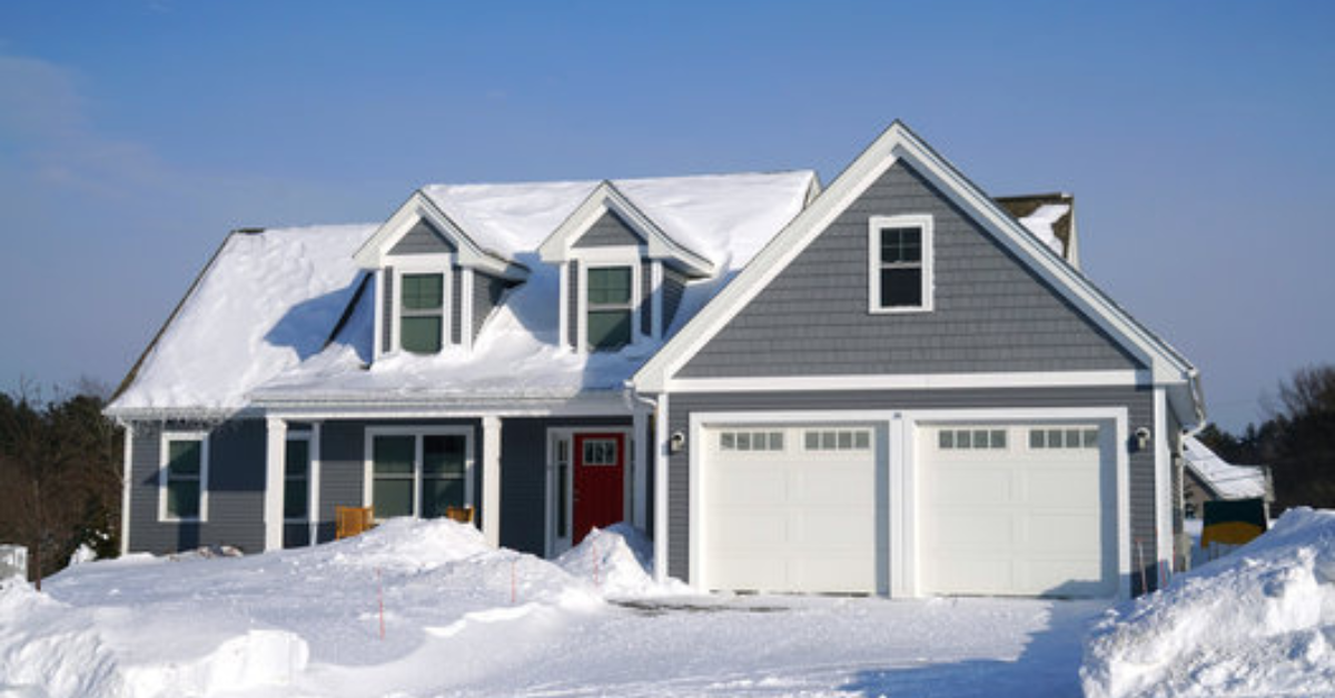 Home covered in snow