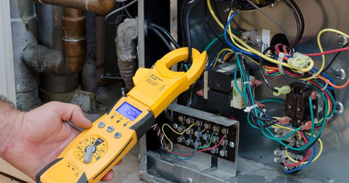 Image of a tech working inside a furnace