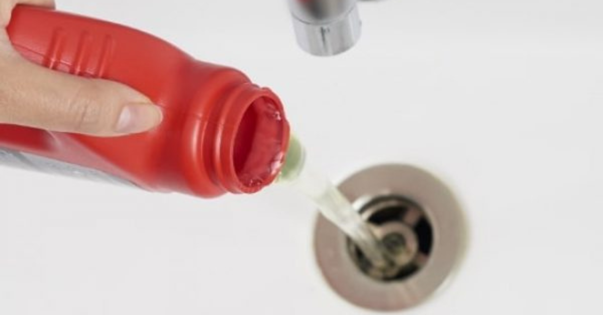 image of someone pouring chemical down a drain